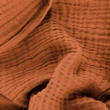 Close-up of textured brown fabric