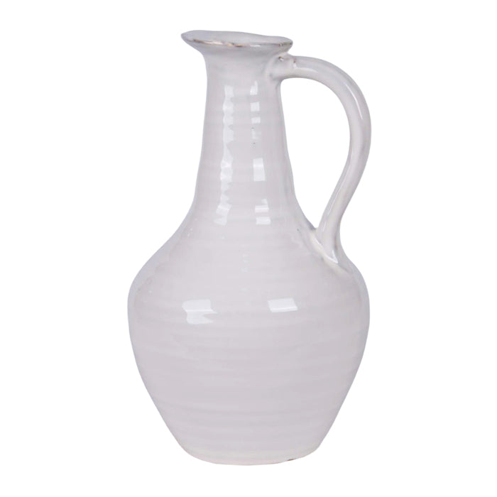 White ceramic pitcher on a white background