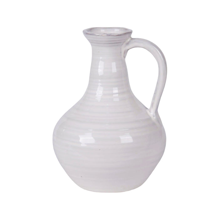 White ceramic pitcher on a white background