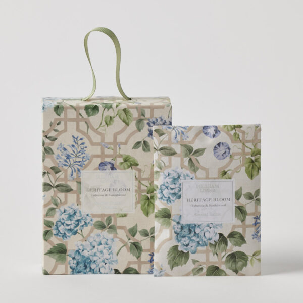 Two floral-patterned boxes with a visible brand label on a white background