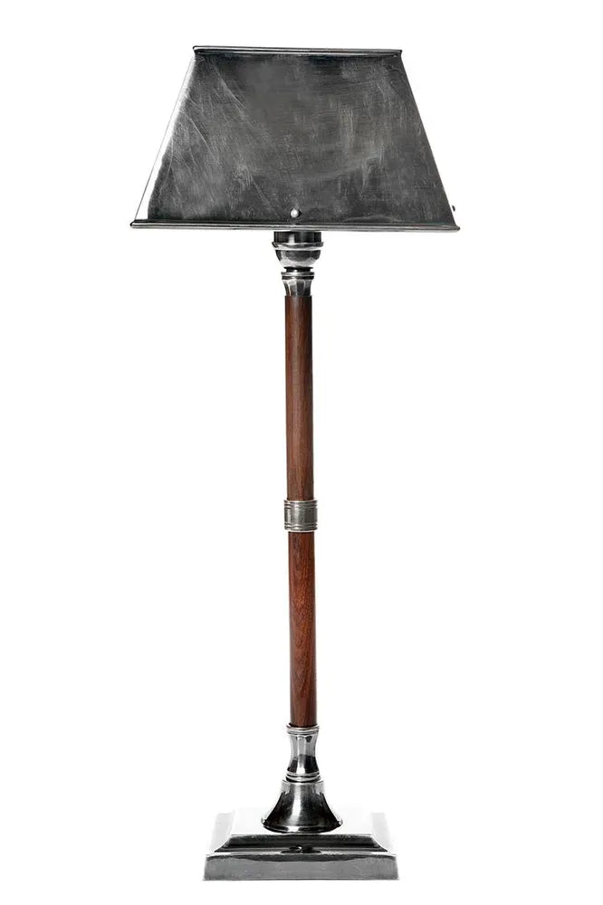 Tall lamp with a dark gray shade, wooden base, and silver accents