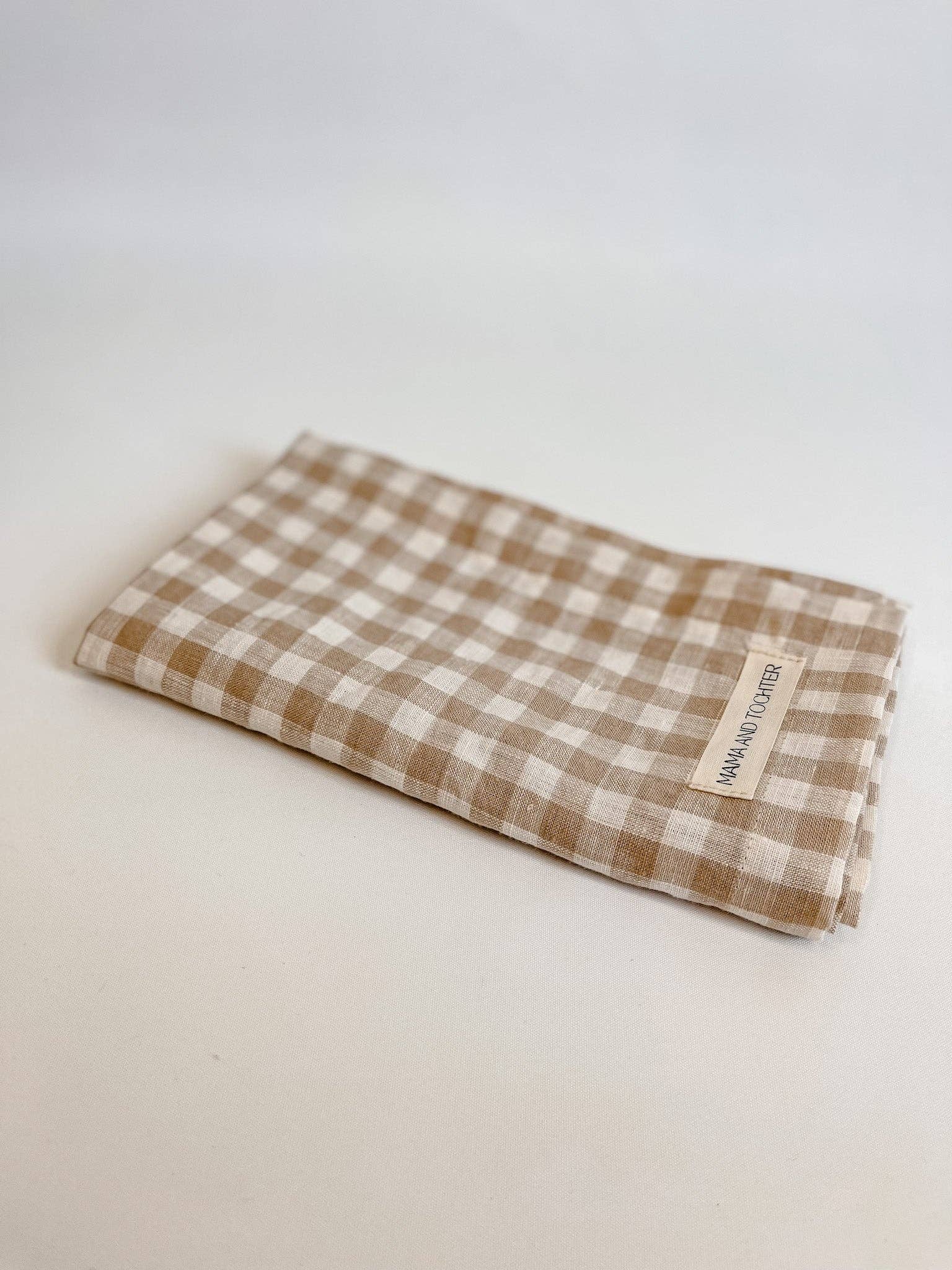 Checkered fabric with a label on a light background