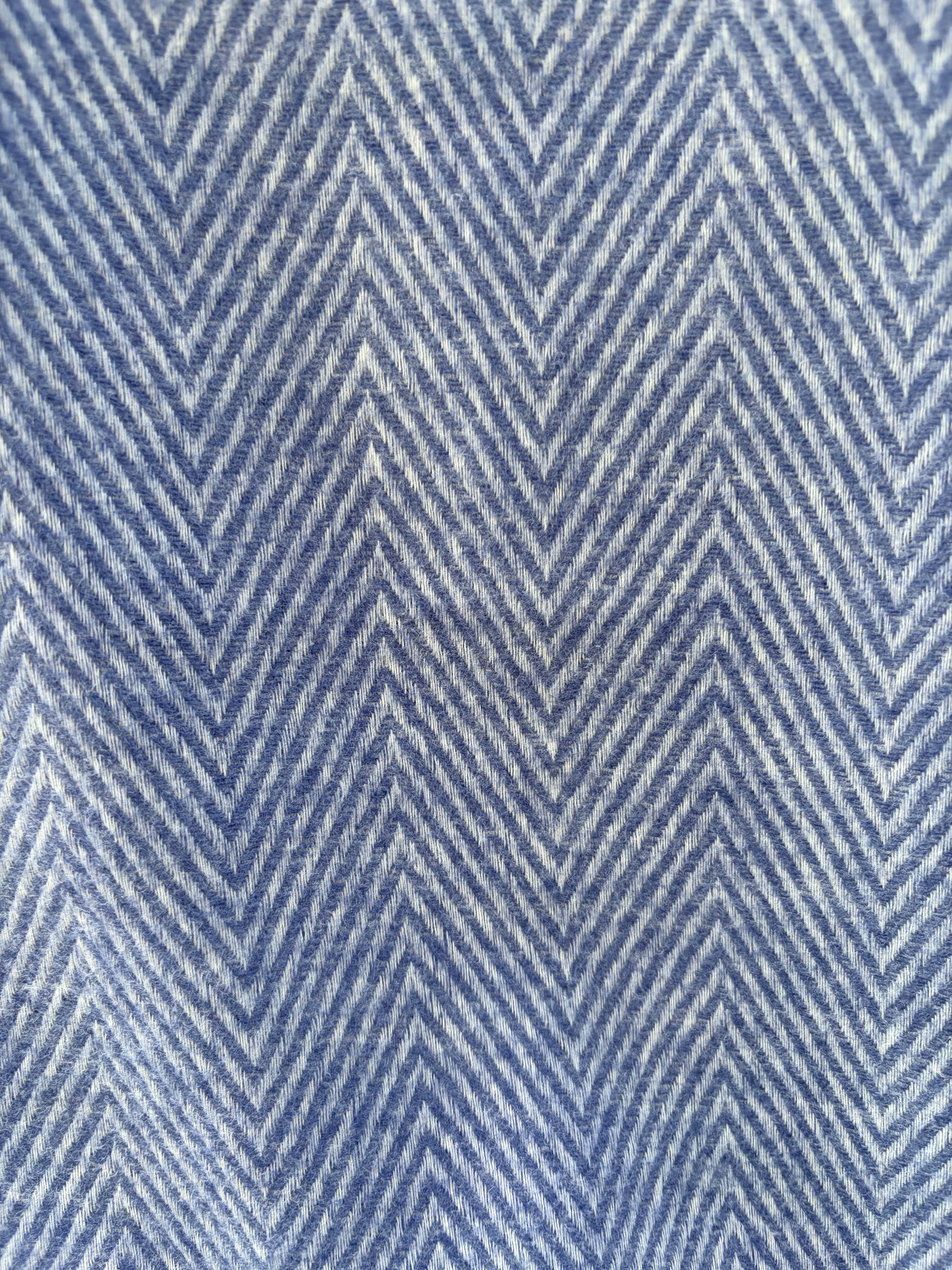 Blue and white chevron patterned fabric texture