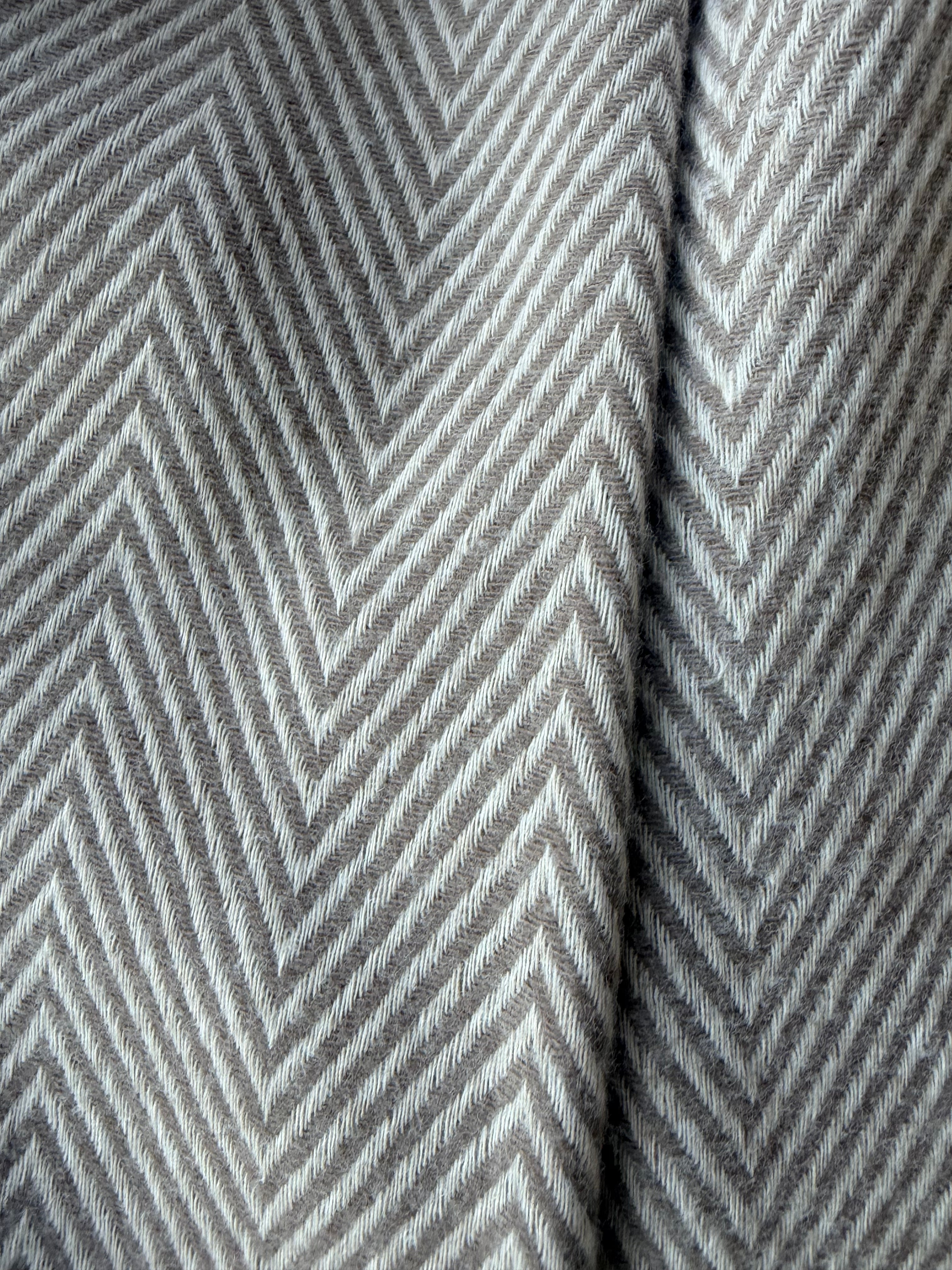 Close-up of gray fabric with a zigzag pattern