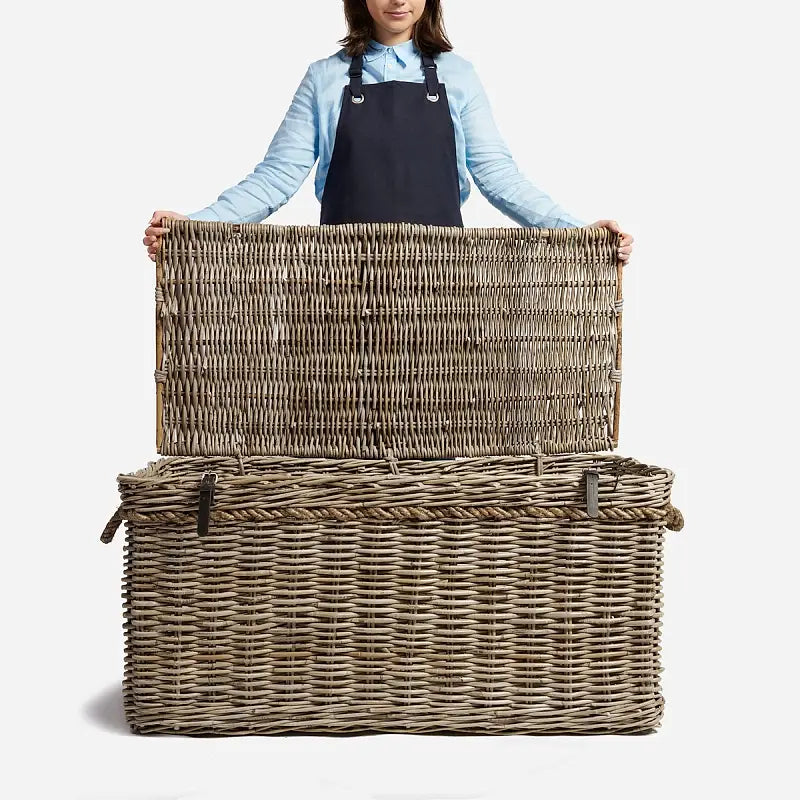 The New England hamper has robust rope handles and smart leather buckled straps. Full height internal central divider helps separate items.

