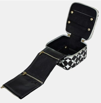 Black jewelry case with geometric pattern on a white background
