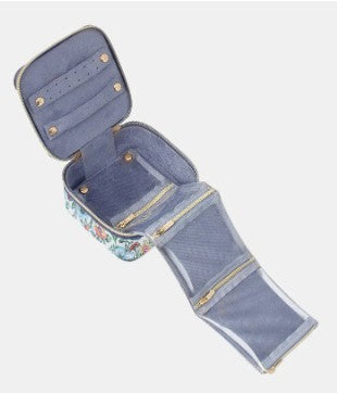 Open jewelry case with compartments on a white background