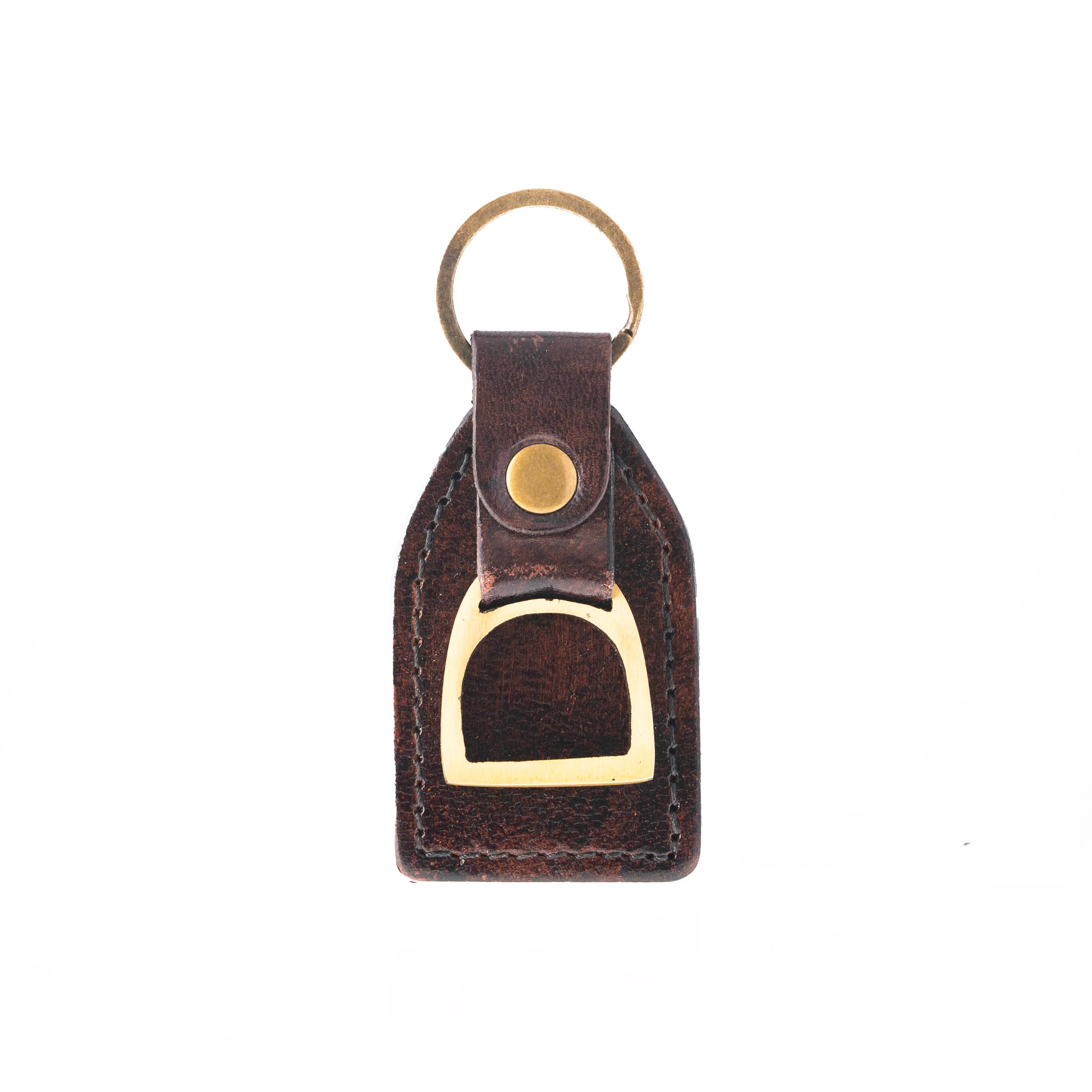 Brown leather key fob with gold accent on a white background