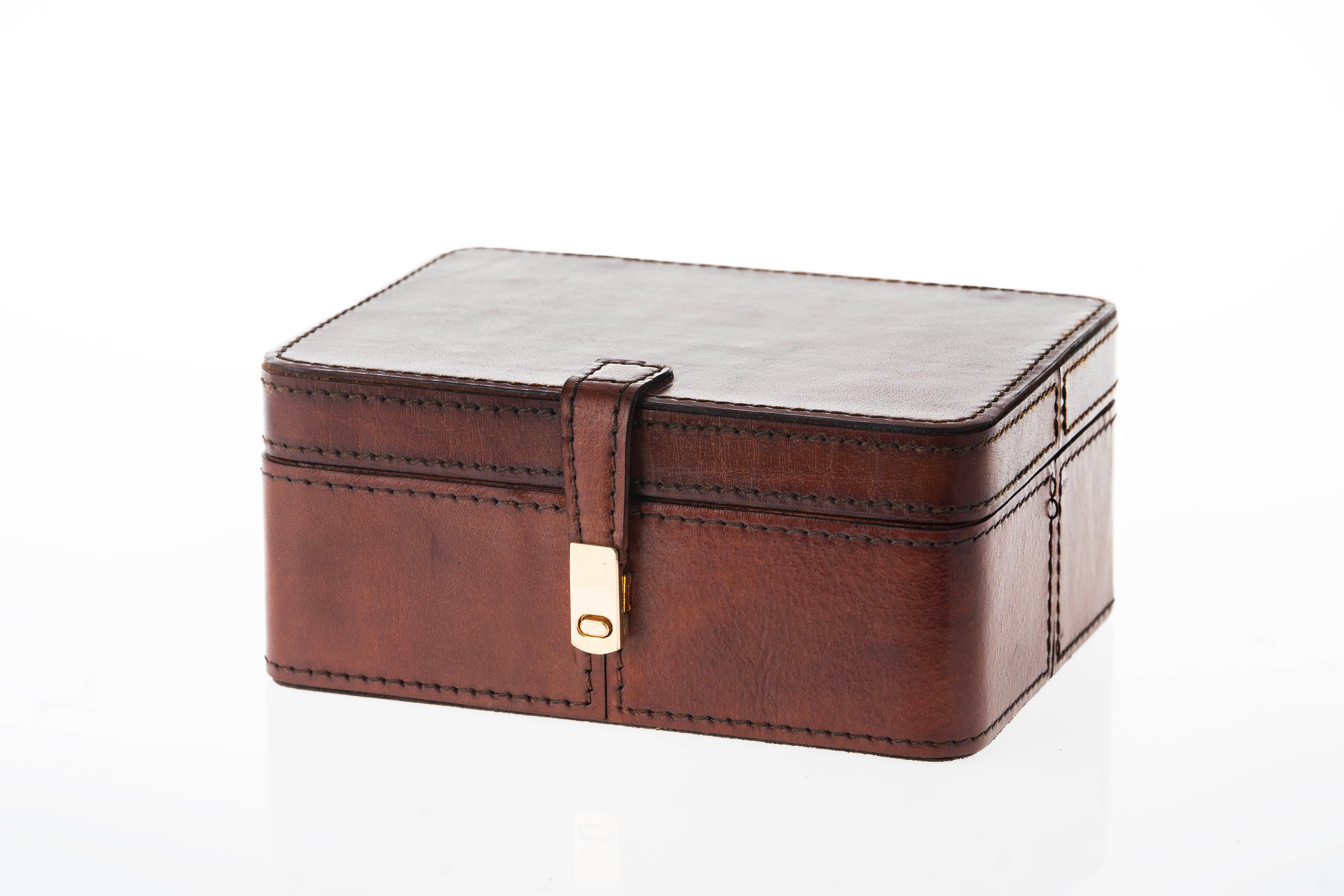 Brown leather  box with gold clasp 