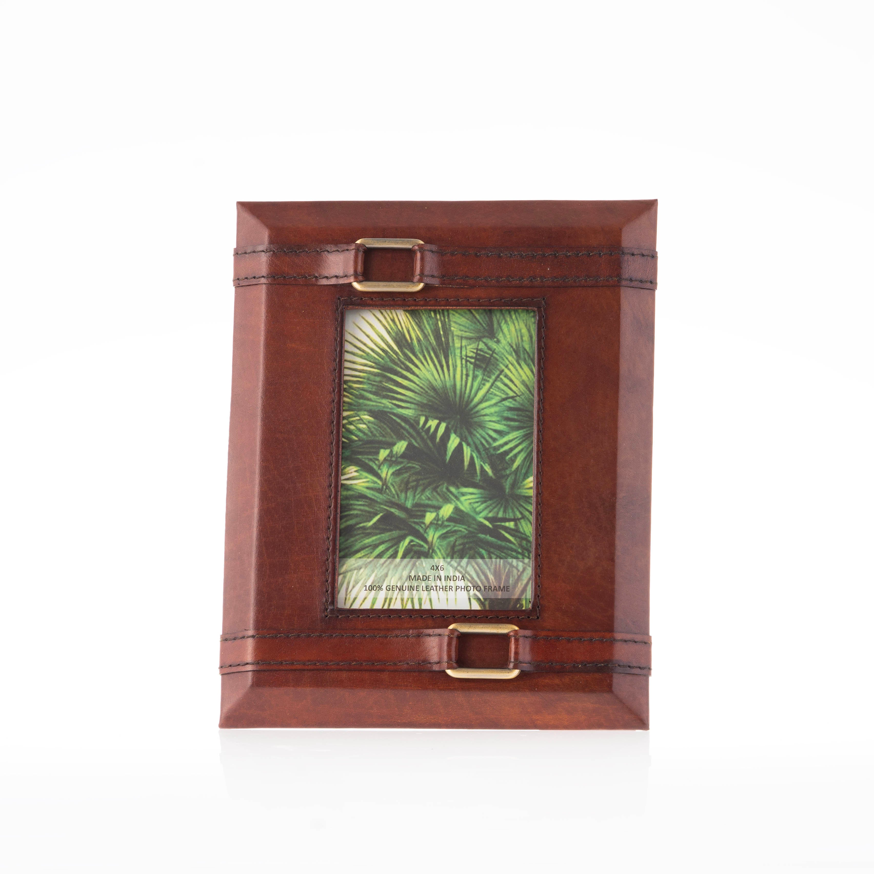 Brown leather picture frame with gold hardware