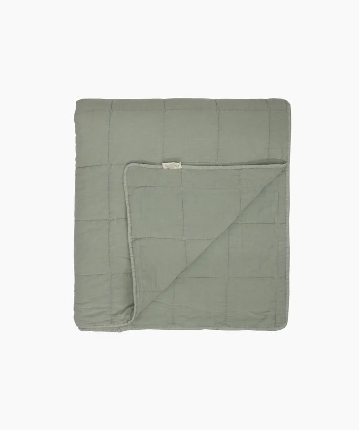 Sage green bedspread with square quilting