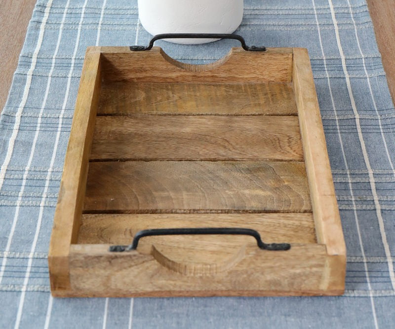 Wooden tray with handles on a blue plaid tablecloth